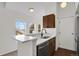 Bright kitchen with quartz countertops and view from three windows at 4760 S Wadsworth Blvd # G304, Littleton, CO 80123