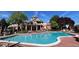 Beautiful community pool, clubhouse, and patio seating areas for entertaining guests at 4760 S Wadsworth Blvd # G304, Littleton, CO 80123
