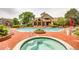 Relaxing community pool and spa area with lounge chairs surrounded by mature landscaping and clubhouse at 4760 S Wadsworth Blvd # G304, Littleton, CO 80123
