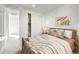 Cozy bedroom featuring a comfortable bed, stylish decor, and closet at 23721 E 40Th Ave, Aurora, CO 80019