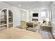 Bright living space features a fireplace and ample seating options at 23721 E 40Th Ave, Aurora, CO 80019