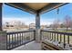 Inviting front porch with a lovely view of the neighborhood and beautiful landscaping at 2490 S Jebel Way, Aurora, CO 80013