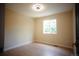 Bedroom with natural light, wood-look floors, and neutral walls at 1552 S Fairplay Way, Aurora, CO 80012