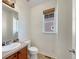 Bathroom with a tile floor, a neutral wall, and modern fixtures at 2245 Whistler Dr, Longmont, CO 80504