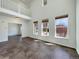 Open living room with abundant natural light and neutral-colored tile flooring throughout at 2245 Whistler Dr, Longmont, CO 80504