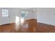 Living room with hardwood floors and front door at 950 S Leyden St, Denver, CO 80224