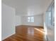Spacious living room with hardwood floors and large windows at 950 S Leyden St, Denver, CO 80224