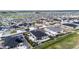 Aerial view of a suburban neighborhood with houses, streets, and open spaces at 4213 Hickory Oaks St, Castle Rock, CO 80104