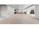 Spacious finished basement with plush carpeting, a comfortable sectional sofa, and recessed lighting at 4213 Hickory Oaks St, Castle Rock, CO 80104