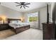 Comfortable bedroom featuring a large bed and a window with a view at 4213 Hickory Oaks St, Castle Rock, CO 80104