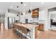 Spacious kitchen featuring a large island, granite countertops, and modern appliances at 4213 Hickory Oaks St, Castle Rock, CO 80104