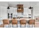 Gourmet kitchen featuring a large island, granite countertops, and pendant lighting at 4213 Hickory Oaks St, Castle Rock, CO 80104