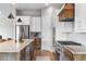 Modern kitchen with stainless steel appliances and custom cabinetry at 4213 Hickory Oaks St, Castle Rock, CO 80104