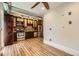 Modern kitchen with stainless steel appliances and wood floors at 740 N Sherman St # 107, Denver, CO 80203