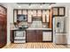 Close up view of modern kitchen with stainless steel appliances at 740 N Sherman St # 107, Denver, CO 80203