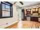 Kitchen with stainless steel appliances and hardwood floors at 740 N Sherman St # 107, Denver, CO 80203