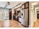Kitchen featuring stainless steel appliances, ample cabinet space, and hardwood floors at 740 N Sherman St # 107, Denver, CO 80203