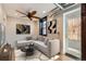 Living room featuring a comfortable sofa, modern decor, and hardwood floors at 740 N Sherman St # 107, Denver, CO 80203