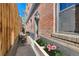Cozy outdoor patio with lounge seating and decorative planter at 740 N Sherman St # 107, Denver, CO 80203