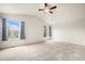 Airy bedroom with a vaulted ceiling, ceiling fan, and well-lit windows for a cozy ambiance at 3542 W 125Th Dr, Broomfield, CO 80020