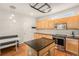 Modern kitchen boasts stainless steel appliances, granite countertops, and ample cabinet space at 3542 W 125Th Dr, Broomfield, CO 80020