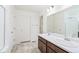 Bright bathroom with double sink vanity, and a separate shower at 20630 E 58Th Ave, Aurora, CO 80019