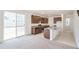 Modern kitchen featuring granite countertops, an island, and stainless steel appliances at 20630 E 58Th Ave, Aurora, CO 80019
