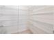 Walk-in pantry featuring wire shelving for plenty of storage at 20630 E 58Th Ave, Aurora, CO 80019