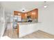Charming kitchen with stainless steel appliances and ample counter space at 11935 E Ford Dr, Aurora, CO 80012