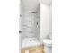 The shower features white marble and silver fixtures at 11935 E Ford Dr, Aurora, CO 80012