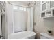 This luxurious bathroom offers a soaking tub, overhead shower, and modern storage cabinets at 8029 W Hoover Pl, Littleton, CO 80123