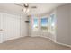 Bright bedroom featuring a cozy bay window and ample natural light at 8184 S Ireland Way, Aurora, CO 80016