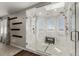 Walk-in shower with glass enclosure featuring multiple shower heads and bright natural light at 8184 S Ireland Way, Aurora, CO 80016