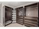 Spacious walk-in closet with custom shelving and ample storage at 8184 S Ireland Way, Aurora, CO 80016