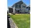 Expansive backyard showcasing a lush lawn and a patio ideal for outdoor gatherings at 21901 E 42Nd Place, Aurora, CO 80019