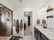 This bathroom features dual sinks, granite countertops, and a tiled walk-in shower at 21901 E 42Nd Place, Aurora, CO 80019
