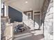 Cozy front porch features stone columns and a comfortable seating area to relax at 21901 E 42Nd Place, Aurora, CO 80019