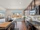 Gourmet kitchen with stainless steel appliances, large island, and ample counter space at 21901 E 42Nd Place, Aurora, CO 80019