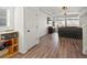Bright and open living room with hardwood floors and large windows fills the space at 21901 E 42Nd Place, Aurora, CO 80019