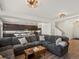 Comfortable living room with a large sectional and plenty of natural light shining at 21901 E 42Nd Place, Aurora, CO 80019