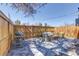 Private fenced backyard featuring a patio, BBQ, and comfortable outdoor seating at 1245 Leyden St, Denver, CO 80220