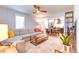 Spacious living room that flows into a modern kitchen, perfect for entertaining at 1245 Leyden St, Denver, CO 80220