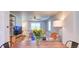 Cozy living room with comfortable seating, a ceiling fan, and natural light at 1245 Leyden St, Denver, CO 80220