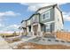 Two-story house with landscaping and stone accents at 20690 E 58Th Ave, Aurora, CO 80019