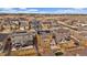 Bird's eye view of the house backyard featuring solar panels and wooden fence at 11828 Churchfield St, Parker, CO 80134