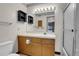 Bathroom with vanity, toilet and shower/tub combo at 979 S Miller St # 202, Lakewood, CO 80226