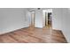 Bedroom with wood-look floors and access to bathroom at 979 S Miller St # 202, Lakewood, CO 80226