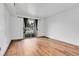 Bedroom with wood floor and access to balcony at 979 S Miller St # 202, Lakewood, CO 80226