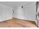 Spacious bedroom with wood-look floors and access to balcony at 979 S Miller St # 202, Lakewood, CO 80226