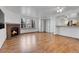 Living room, kitchen, and dining area with wood floors at 979 S Miller St # 202, Lakewood, CO 80226